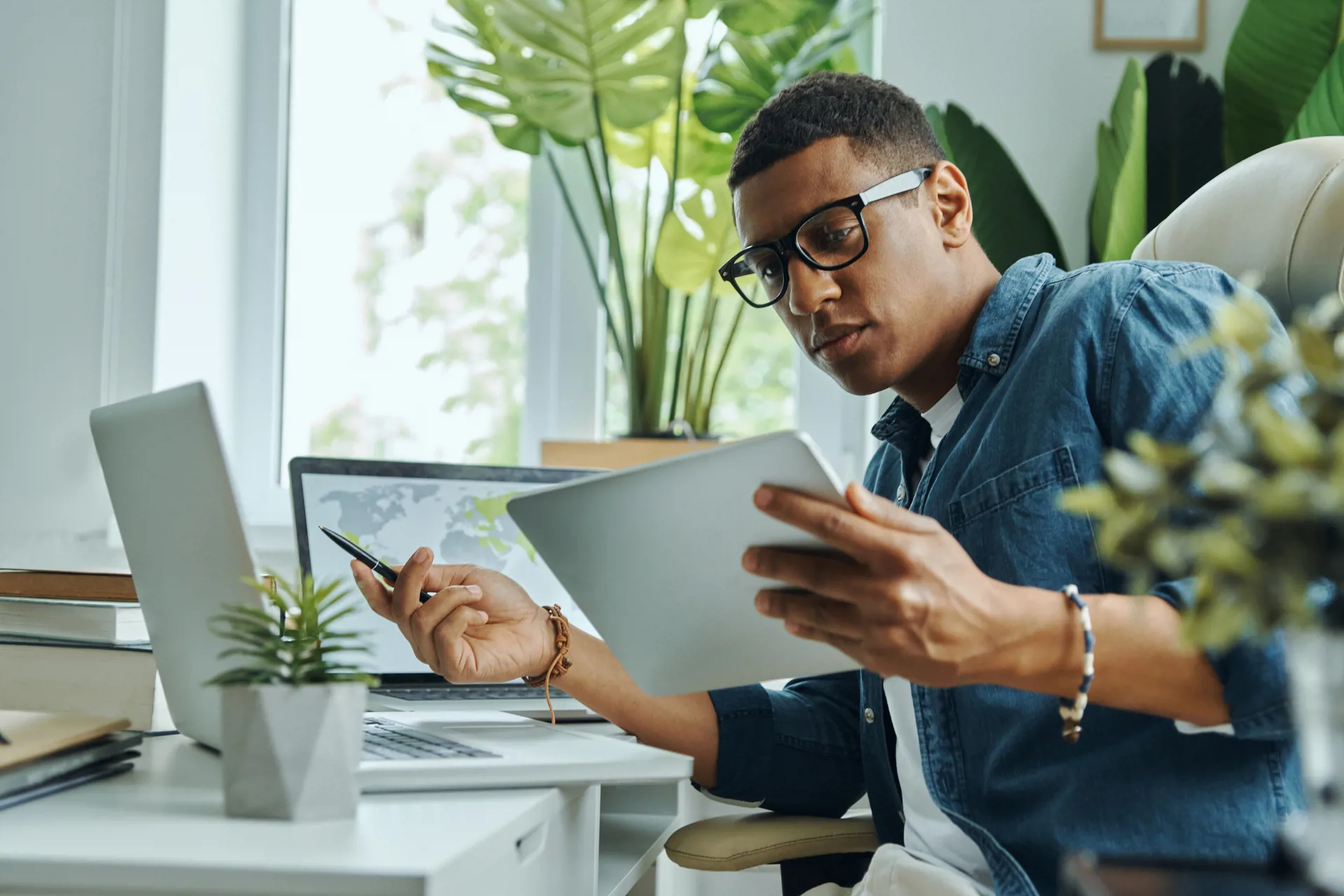Man looking at tablet