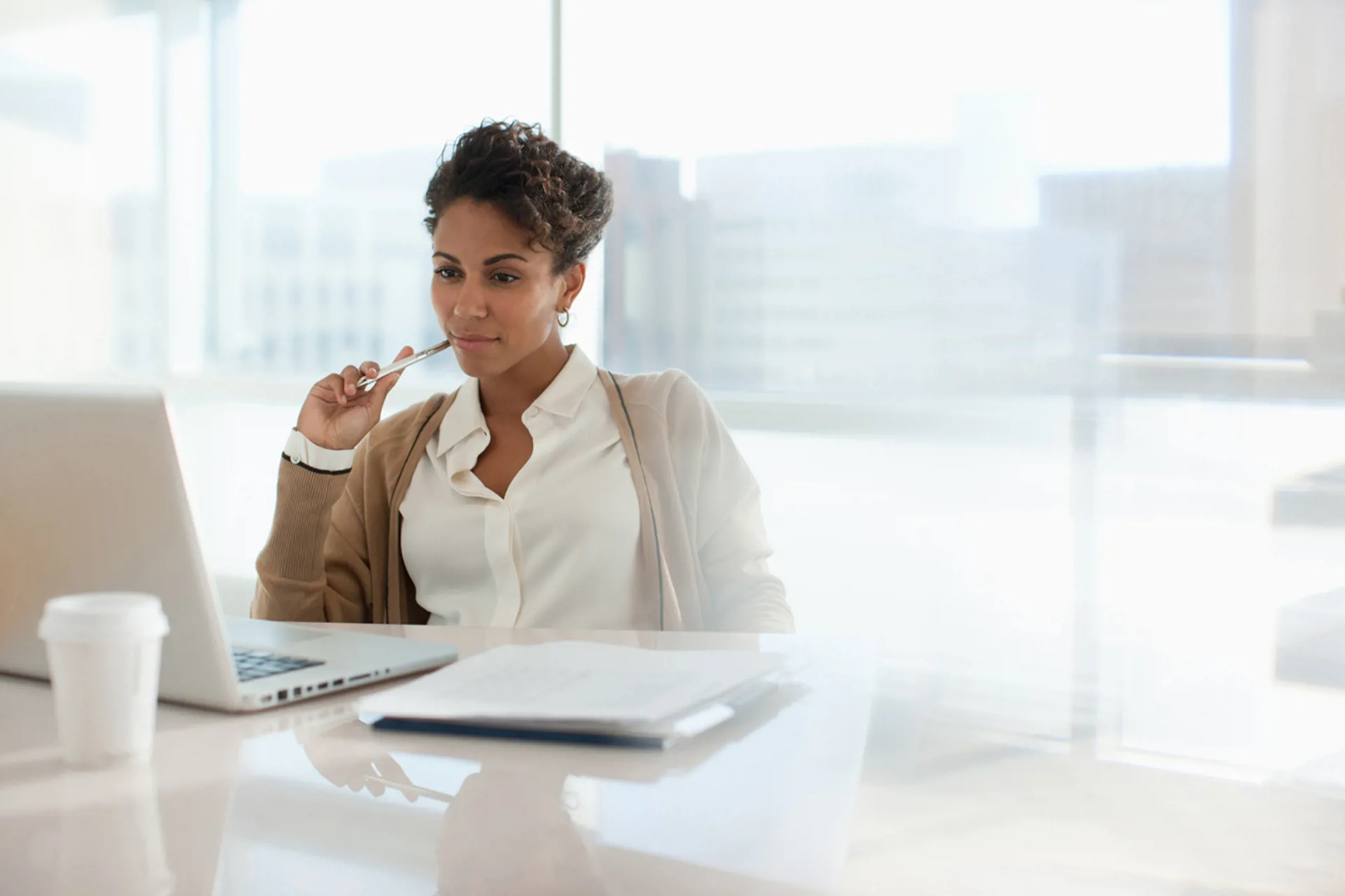 woman looking at finances